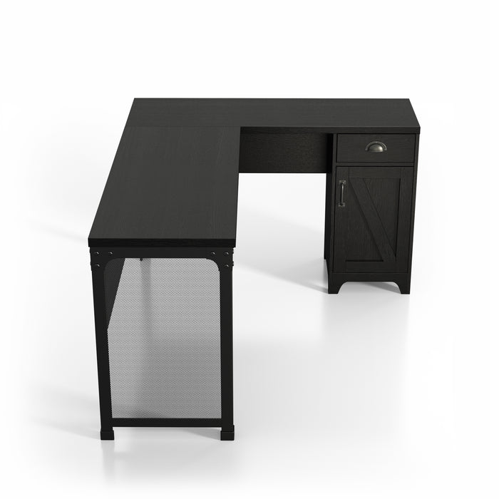 Top view of a black L-shaped desk against a white background. On one end is wire mesh with corner brackets accented with bolts. The other end holds a drawer with a cup pull and a barn-inspired cabinet door.