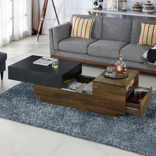Left angled contemporary light hickory storage coffee table with drawers open in a living room with accessories