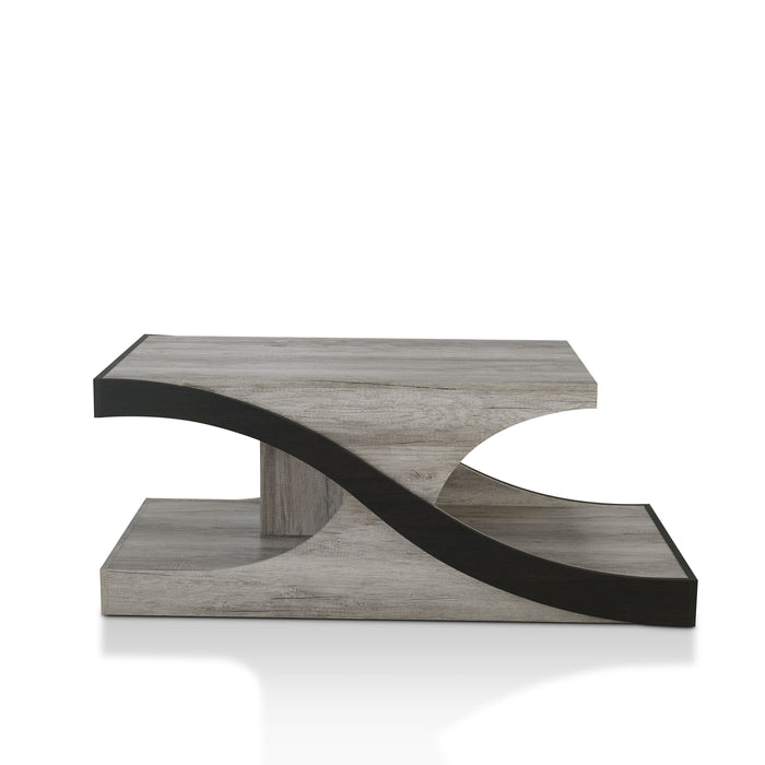 Front-facing modern vintage gray oak wave coffee table on a white background