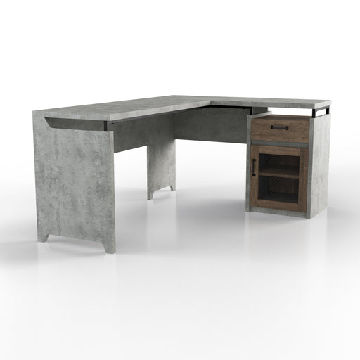 Right-angled cement-inspired L-shaped desk against a white background. The desktop is slightly elevated from the built-in drawer on the right. A wire-mesh accented cabinet door reveals shelving within.