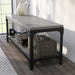 Left angled urban vintage gray oak one-shelf bench in an entryway with accessories