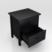 Right angled top view transitional two-drawer black nightstand with lower drawer open on a white background