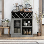 Front-facing vintage grey oak wine buffet against a white wall. Baking supplies present themselves on the tabletop while the lattice wine rack holds four bottles. On the open shelves are dishes and cookie jars. To the left of the server is a stool holding a basket of flowers.