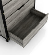 Right angled close up drawer of dresser in a vintage gray oak finish on a white background