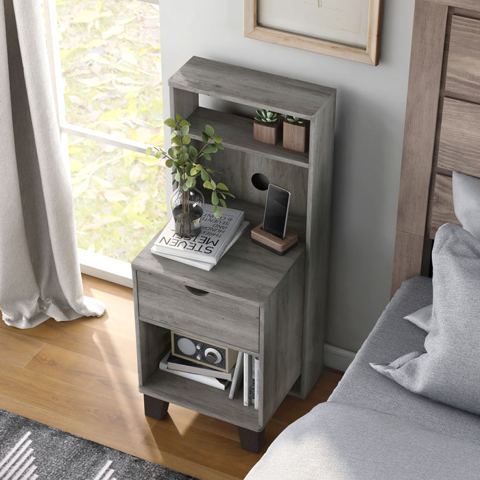 Left-angled top-view transitional vintage gray finish wood one-drawer nightstand with fixed shelf in a modern farmhouse bedroom with accessories