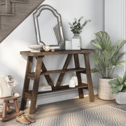 Right angled two shelf console table in a reclaimed oak finish in a room with accessories