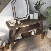 Right angled two shelf console table in a reclaimed oak finish in a room with accessories